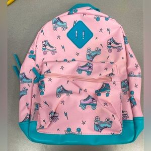 12 inch backpack with roller skate print and matching neck pillow